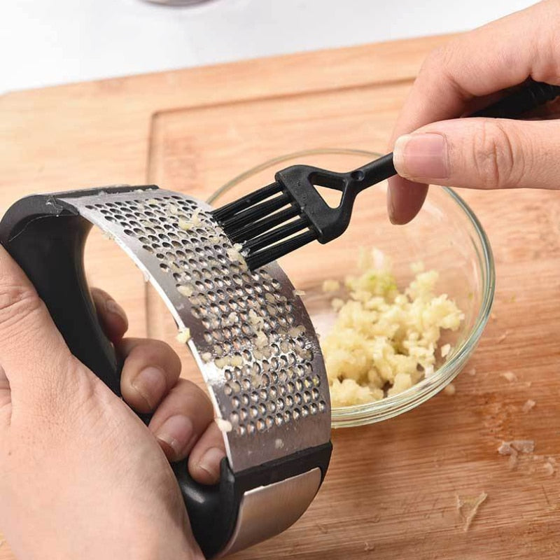 Stainless Steel Garlic Press and Peeler - Easy to Use Manual